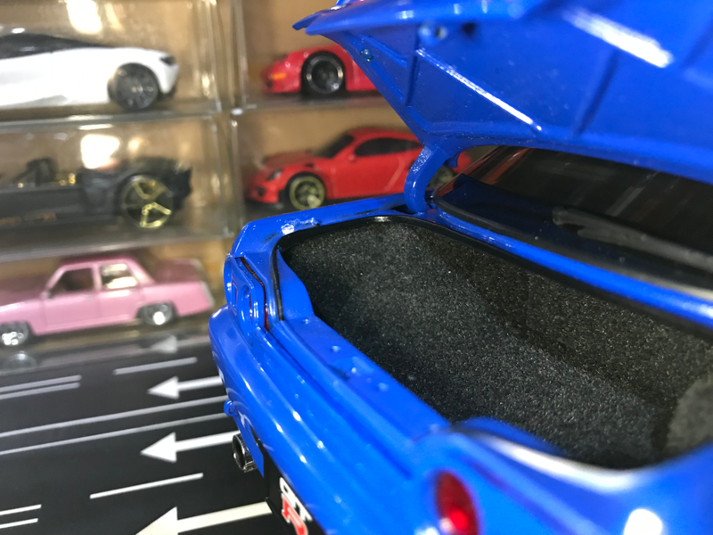 The trunk, like the interior, is carpeted. One demerit for this model is that the bottom of the trunk rubber seal is not painted black.